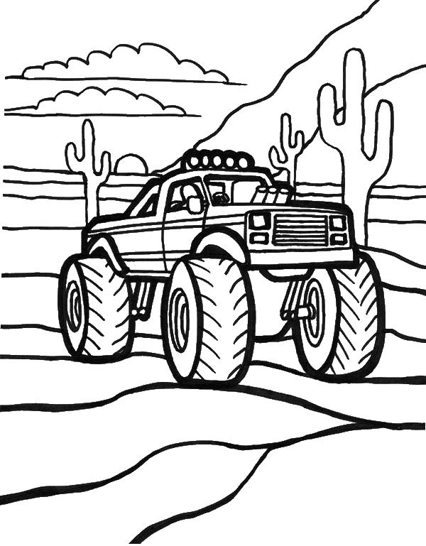  Внедорожник в пустыне с кактусами Машина на больших колесах в пустыне.